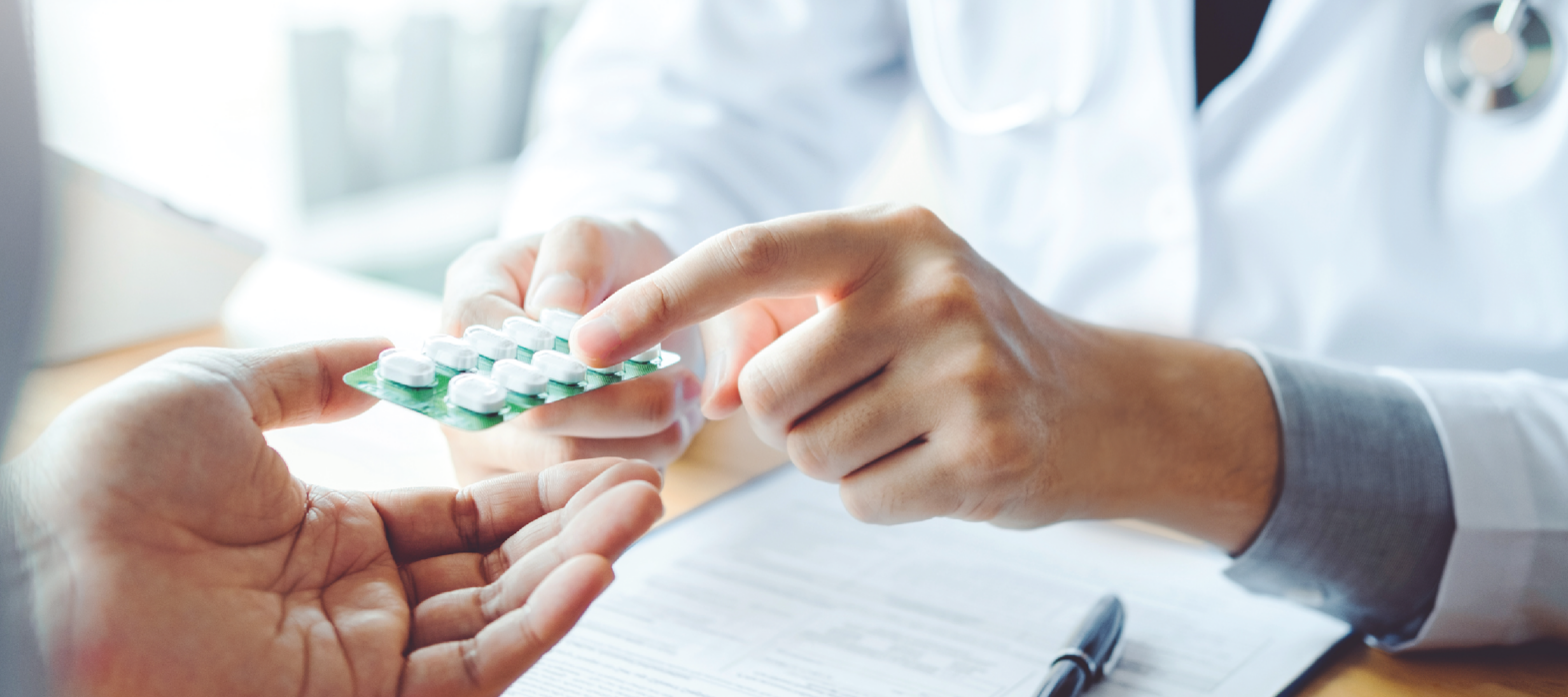 clinical trial image doctor showing medication
